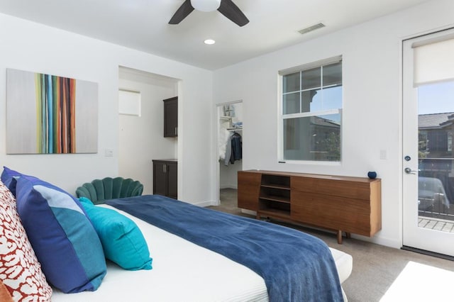 bedroom with ceiling fan, access to outside, and carpet flooring