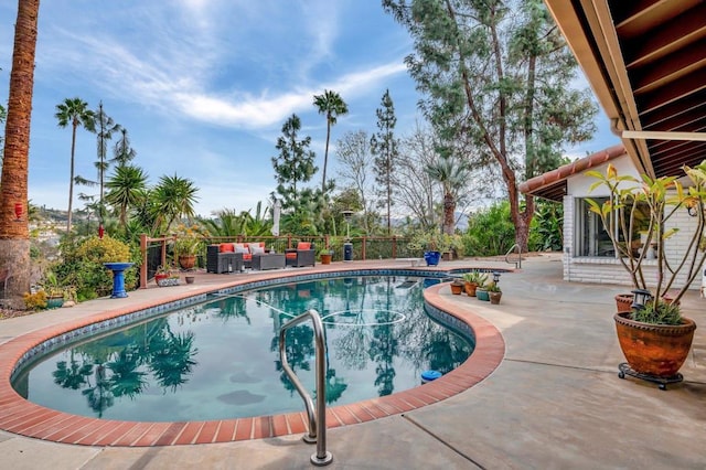 view of swimming pool with an outdoor hangout area and a patio