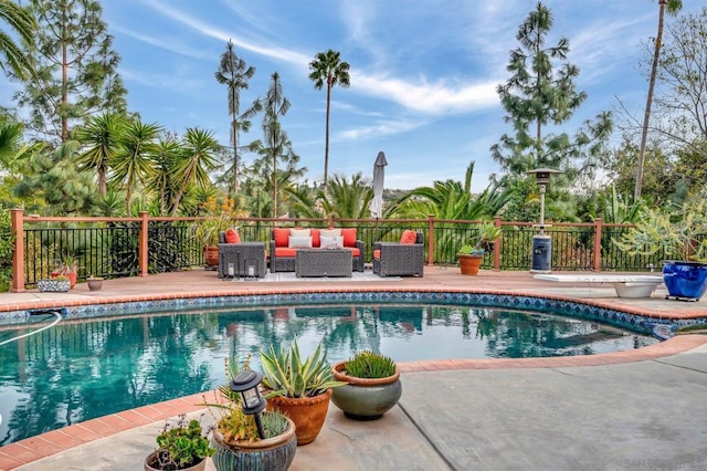 view of pool with a patio area and an outdoor hangout area