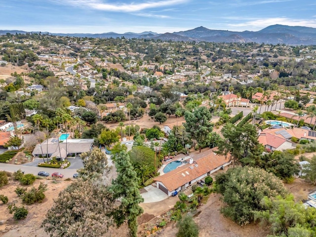 drone / aerial view featuring a mountain view