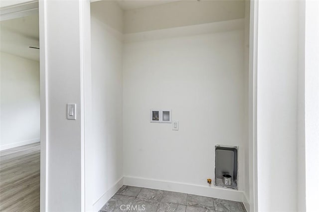 laundry area featuring washer hookup, laundry area, baseboards, and hookup for a gas dryer