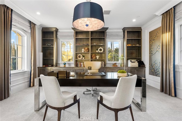 home office with light carpet and crown molding