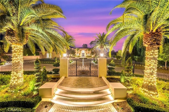 view of patio terrace at dusk