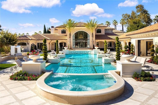 view of pool featuring a patio