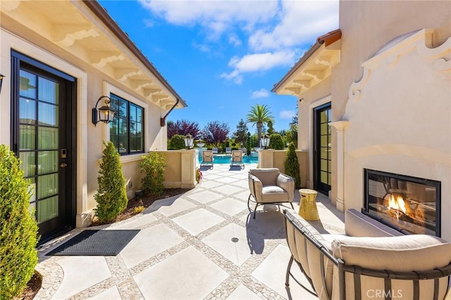 view of patio with a swimming pool