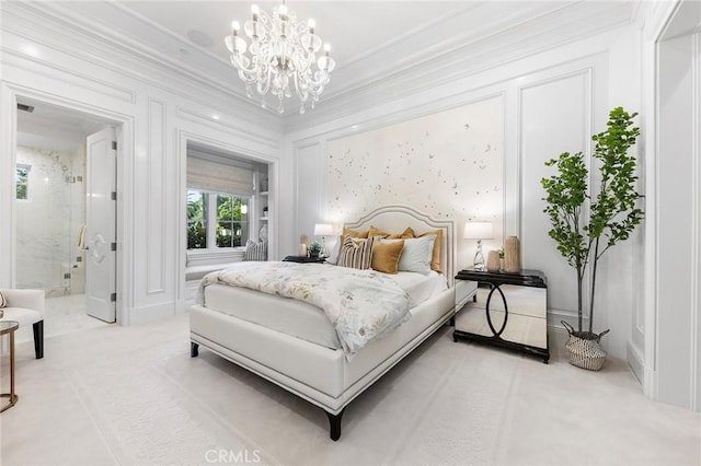 bedroom with carpet, ensuite bathroom, crown molding, and a chandelier