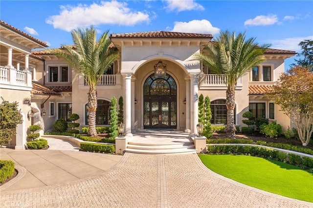 entrance to property featuring french doors