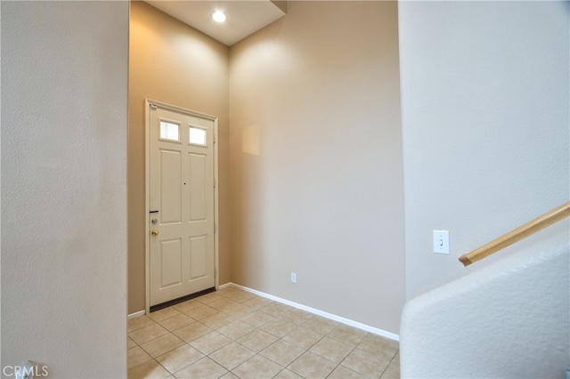 foyer with light tile patterned flooring