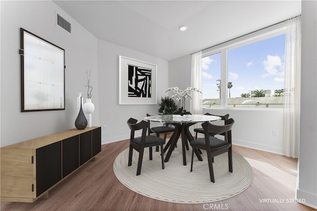 dining room featuring hardwood / wood-style floors