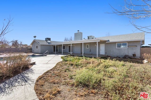 single story home with a patio