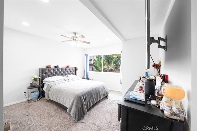 bedroom with ceiling fan and carpet flooring