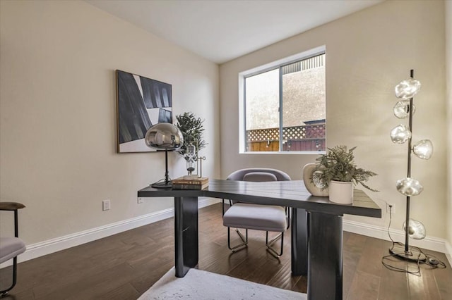 office with dark hardwood / wood-style floors