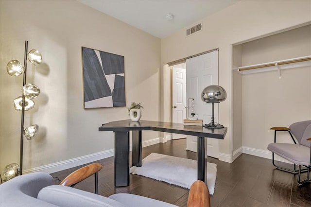 home office featuring dark hardwood / wood-style flooring