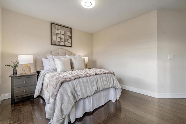 bedroom featuring dark wood-type flooring