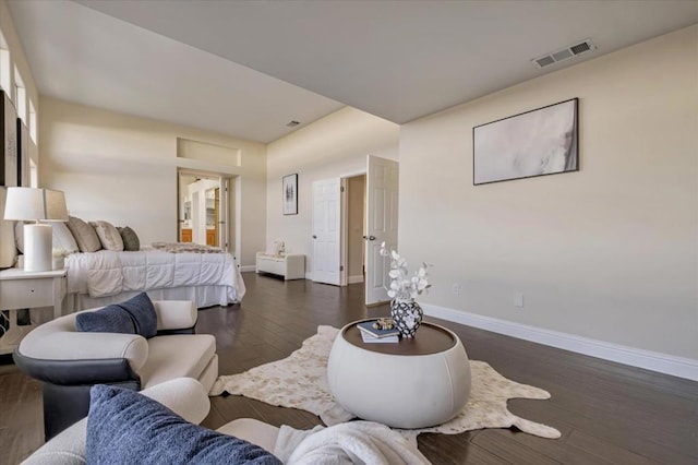 bedroom featuring dark hardwood / wood-style flooring