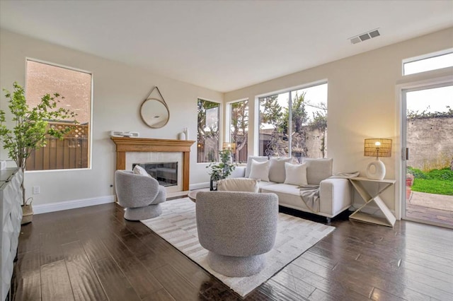 living room with dark hardwood / wood-style floors