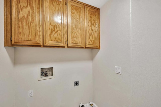 laundry room featuring cabinets, hookup for an electric dryer, and washer hookup