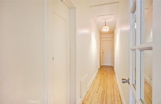 corridor featuring light hardwood / wood-style flooring