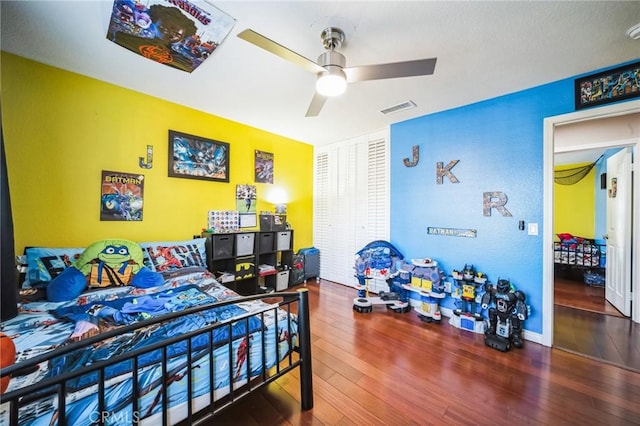 bedroom featuring ceiling fan and wood-type flooring