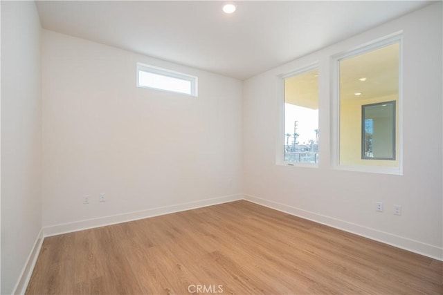 414 Main St Unit 310, Huntington Beach, CA 92647 - empty room with light wood-style floors, baseboards, and recessed lighting