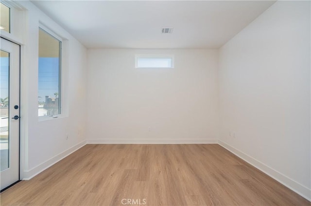 414 Main St Unit 310, Huntington Beach, CA 92647 - spare room featuring light wood-style floors and baseboards