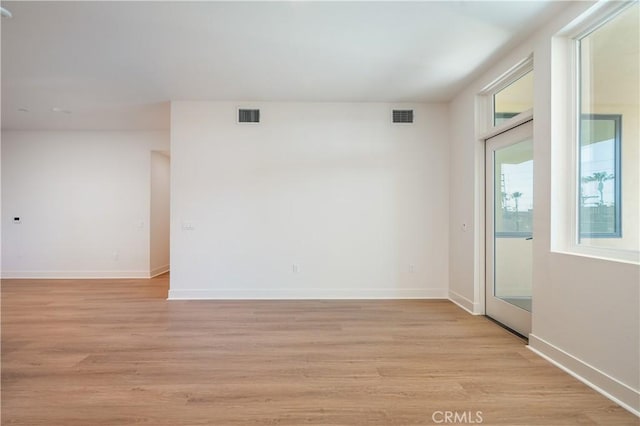 414 Main St Unit 310, Huntington Beach, CA 92647 - empty room with light wood-type flooring and baseboards