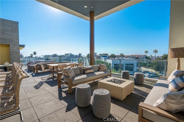 414 Main St Unit 310, Huntington Beach, CA 92647 - view of patio / terrace with an outdoor living space with a fire pit