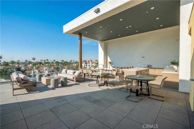 414 Main St Unit 310, Huntington Beach, CA 92647 - view of patio with an outdoor hangout area and an outdoor kitchen