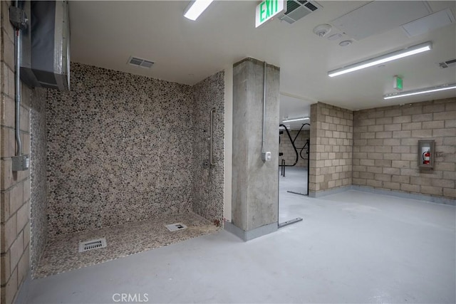 414 Main St Unit 310, Huntington Beach, CA 92647 - bathroom with concrete flooring and a tile shower