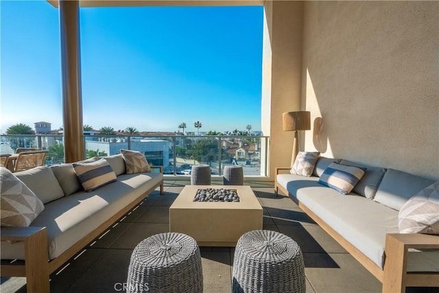 414 Main St Unit 310, Huntington Beach, CA 92647 - view of patio / terrace featuring an outdoor living space with a fire pit