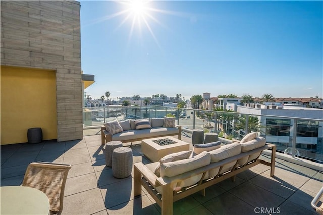 414 Main St Unit 310, Huntington Beach, CA 92647 - view of patio with an outdoor living space with a fire pit and a balcony