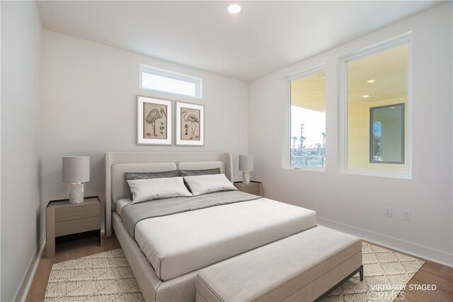 414 Main St Unit 310, Huntington Beach, CA 92647 - bedroom featuring wood finished floors, baseboards, and recessed lighting