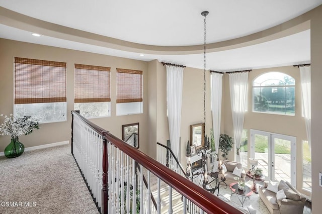 hallway with carpet flooring