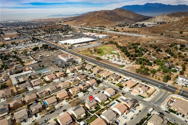 drone / aerial view featuring a mountain view