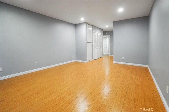 unfurnished room featuring light hardwood / wood-style flooring