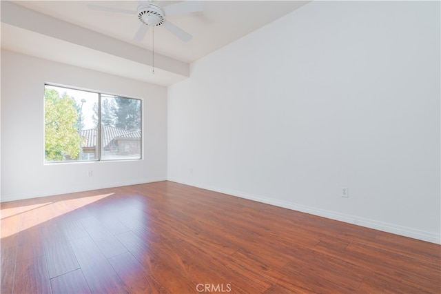 spare room featuring ceiling fan and wood-type flooring