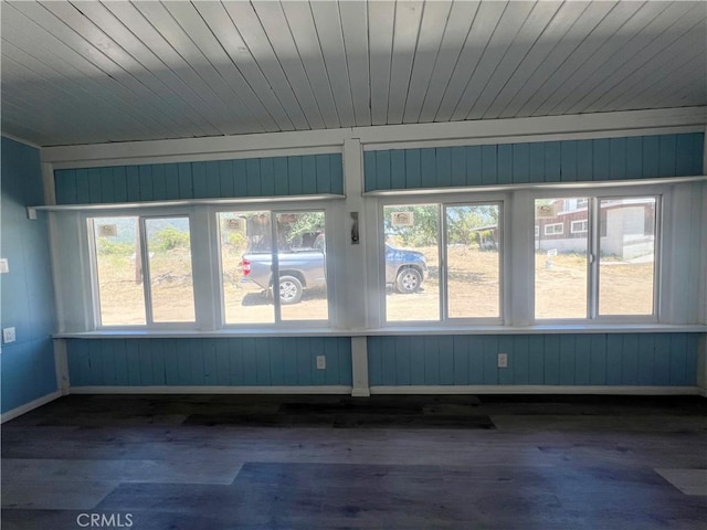 empty room featuring dark wood-type flooring