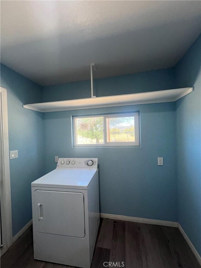 laundry room with dark hardwood / wood-style flooring and washer / clothes dryer