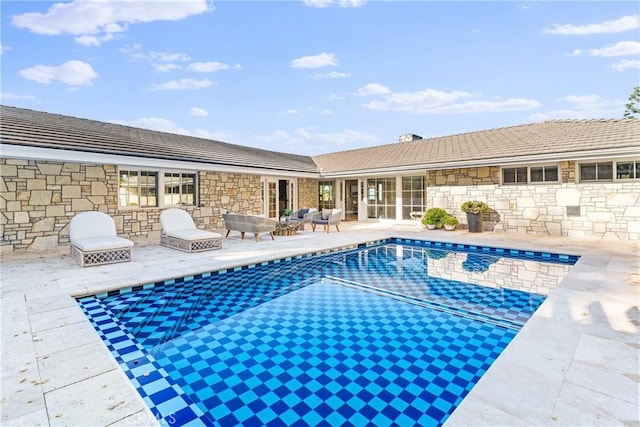 view of pool with a patio