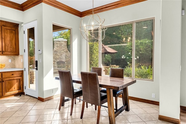 dining space featuring a notable chandelier and crown molding