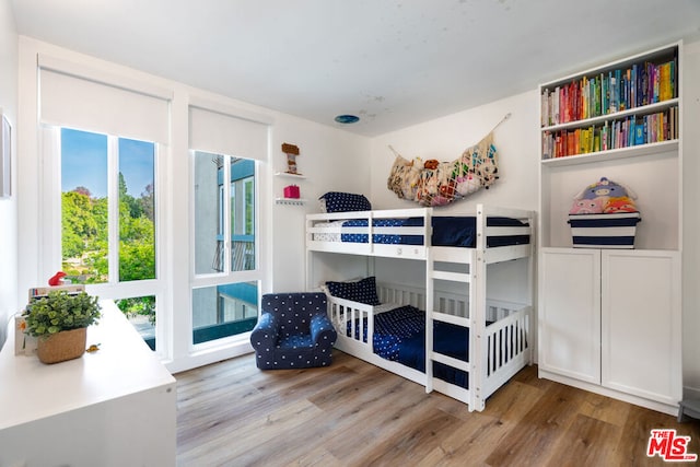 bedroom featuring hardwood / wood-style flooring