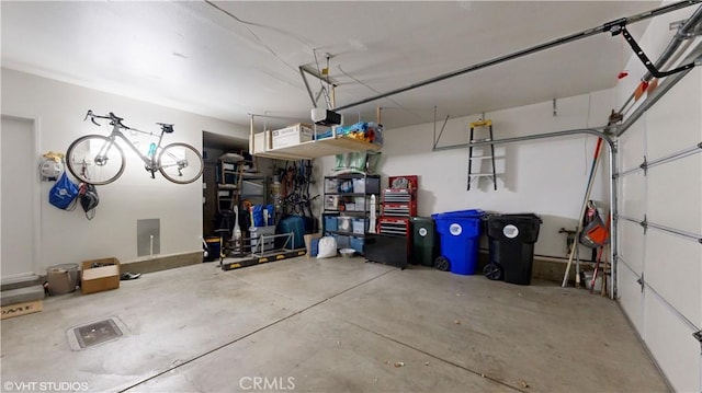 garage featuring a garage door opener