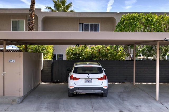 view of parking / parking lot with a carport