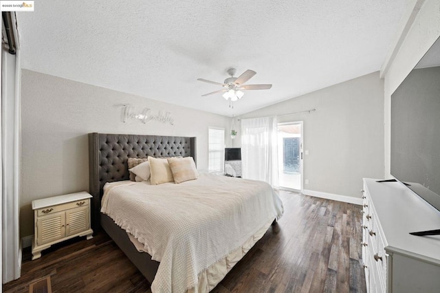 bedroom featuring lofted ceiling, a textured ceiling, access to outside, dark hardwood / wood-style floors, and ceiling fan