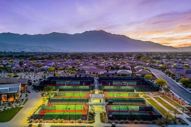 aerial view at dusk with a mountain view