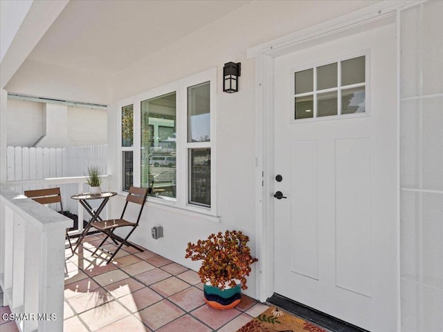 entrance to property with covered porch