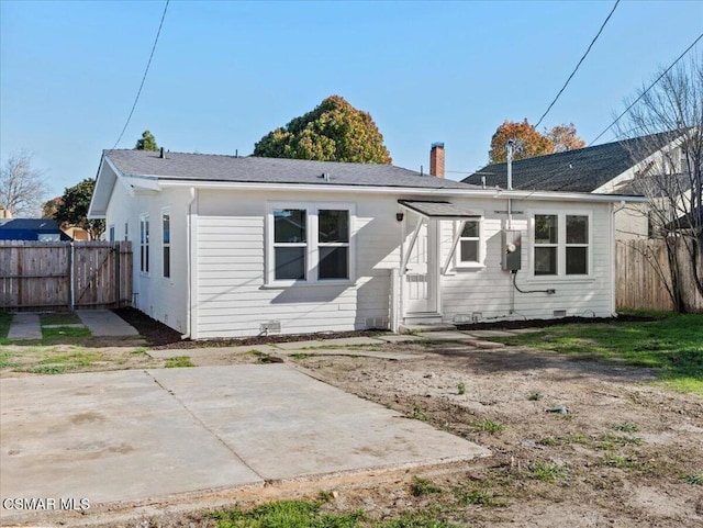 back of house featuring a patio