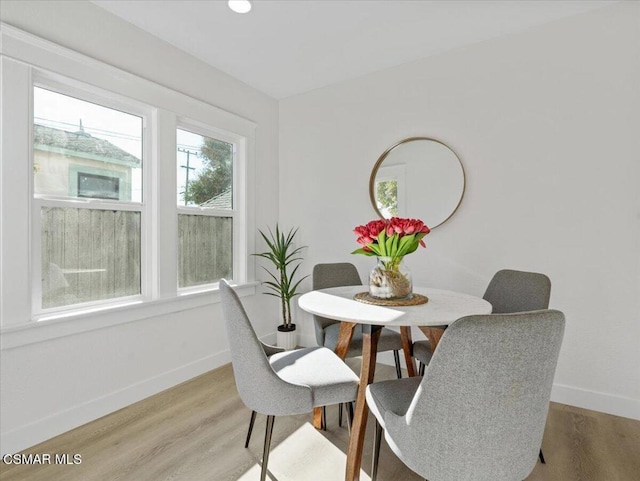 dining area featuring hardwood / wood-style flooring