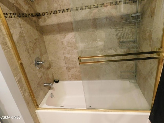 bathroom featuring enclosed tub / shower combo