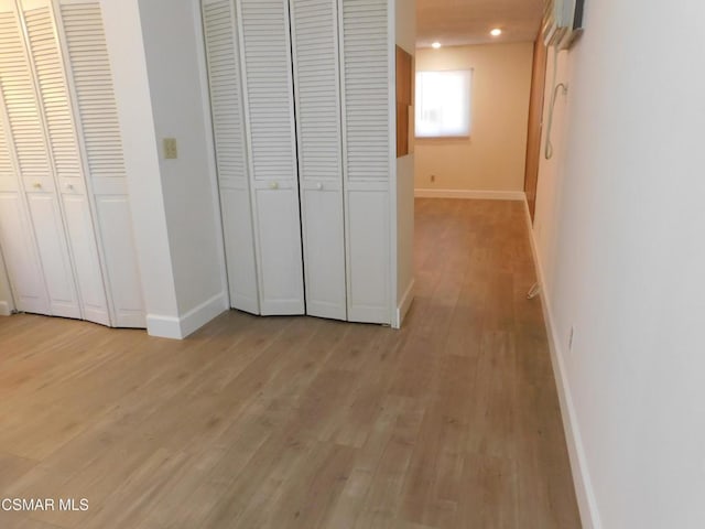 hallway featuring light wood-type flooring